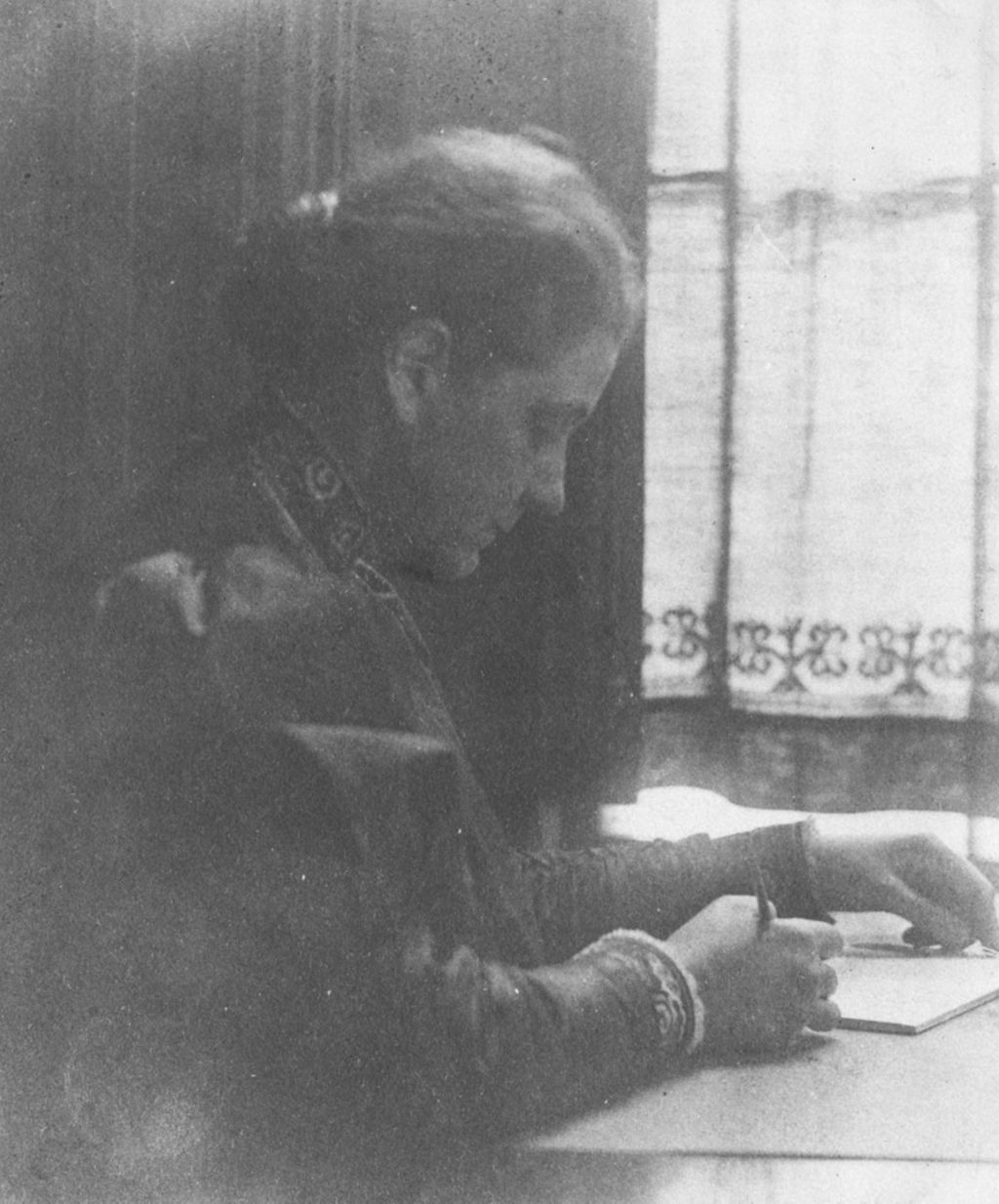Miniature of Jane Addams writing