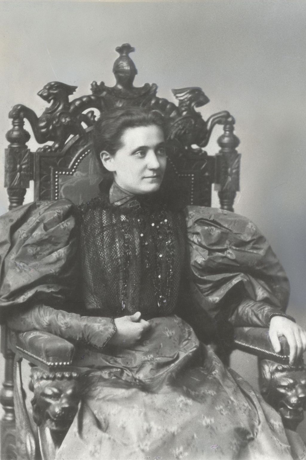 Miniature of Jane Addams seated in ornate chair