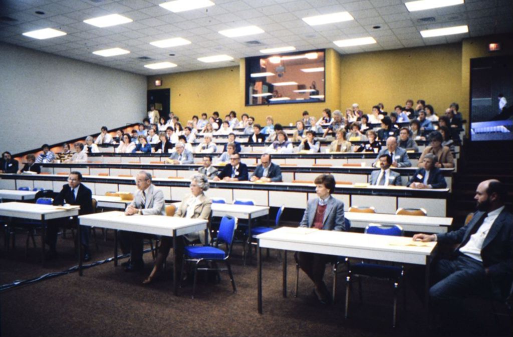Miniature of People in lecture hall